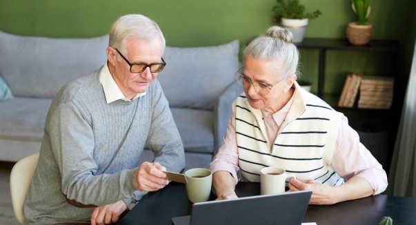 aged couple having coffee